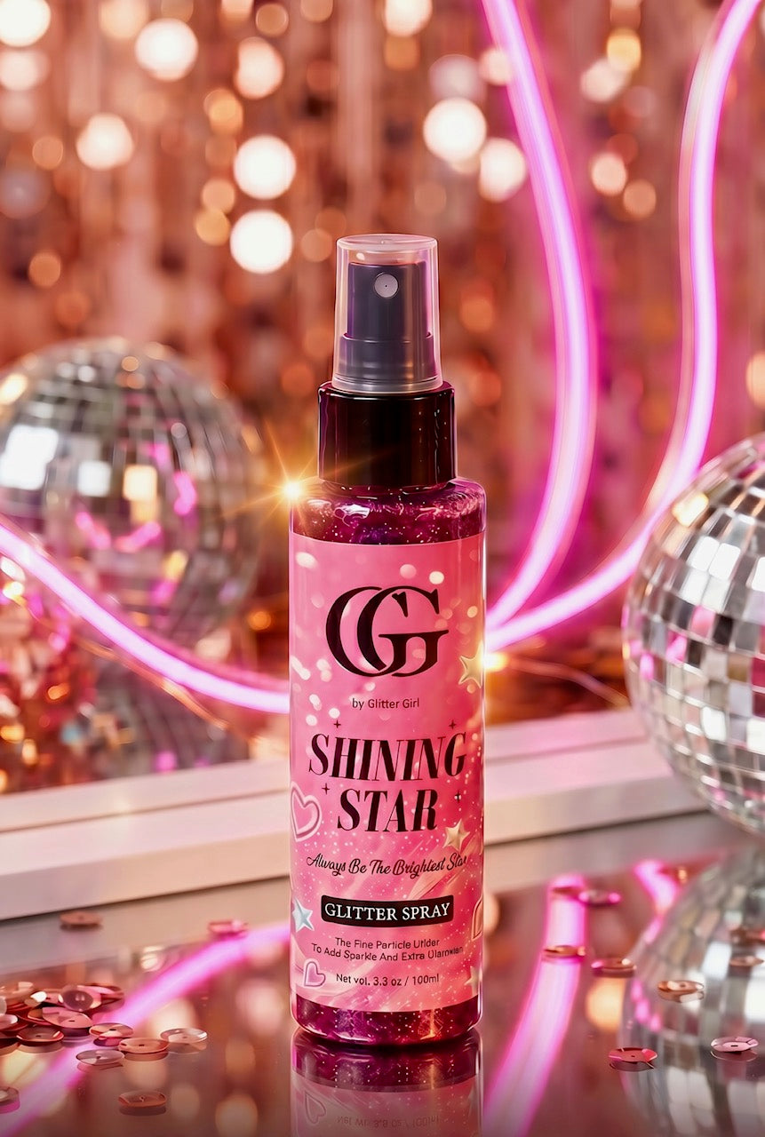 A bottle of CG by glitter girl Shining Star Glitter Spray, filled with sparkling pink glitter, set against a festive background with pink neon lights, and disco balls.